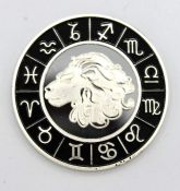 Сувенирная монета - знак зодиака "Лев"